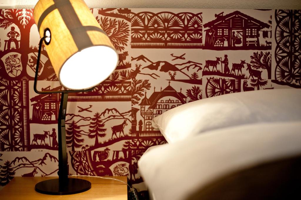 Postel nebo postele na pokoji v ubytování Hotel Landhaus