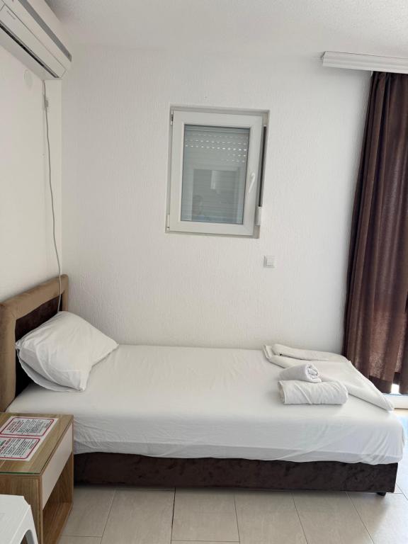 Krevet ili kreveti u jedinici u okviru objekta Apartmani Hadžić