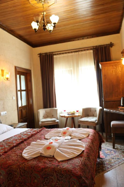 Postel nebo postele na pokoji v ubytování Bella Vista Stone House