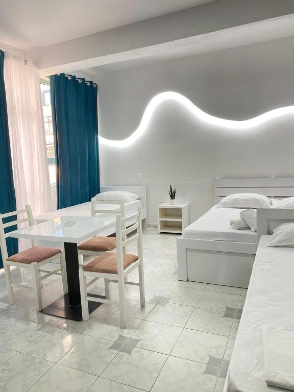 Postel nebo postele na pokoji v ubytování Rai Rooms