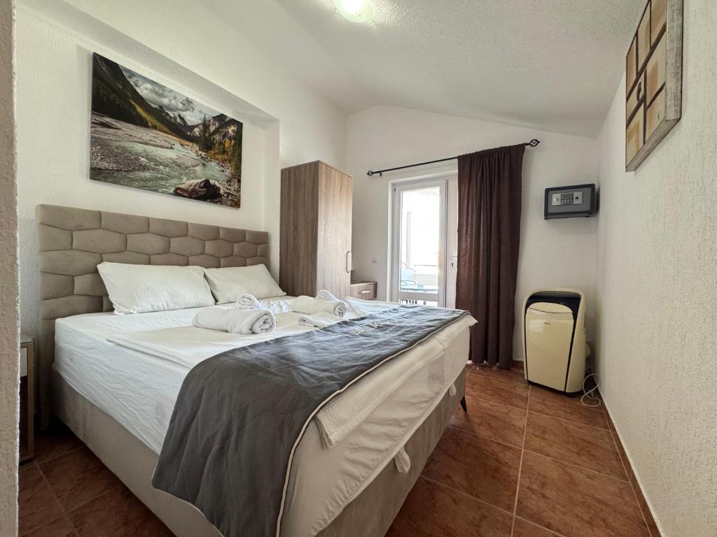 Krevet ili kreveti u jedinici u okviru objekta Apartmani Hadžić