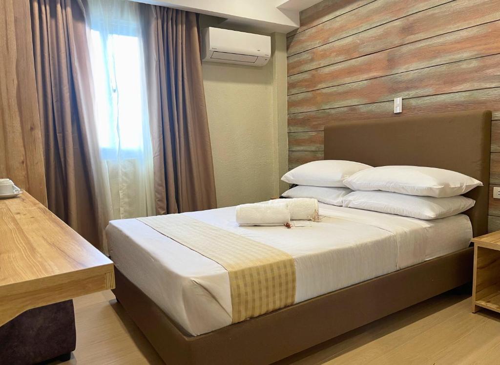 Postel nebo postele na pokoji v ubytování Sola Hotel