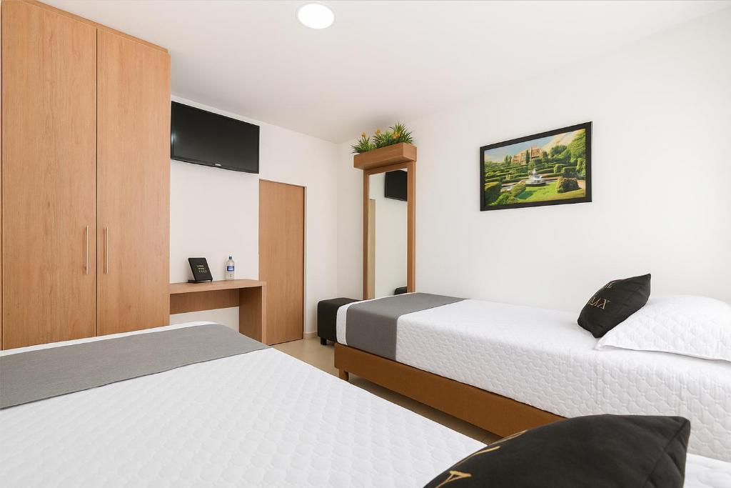 Postel nebo postele na pokoji v ubytování Hotel de la Salle