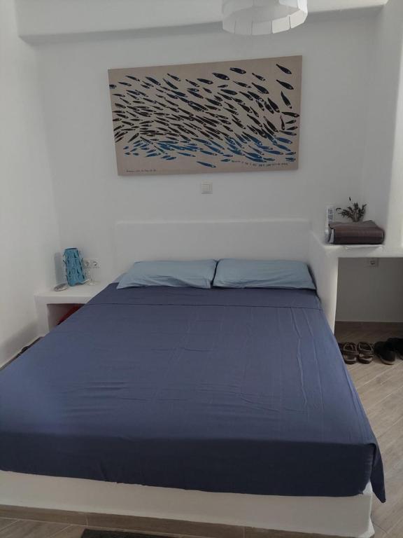 Posteľ alebo postele v izbe v ubytovaní Plaka Sunset Naxos Home