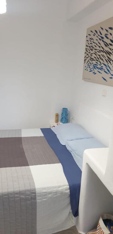 Posteľ alebo postele v izbe v ubytovaní Plaka Sunset Naxos Home