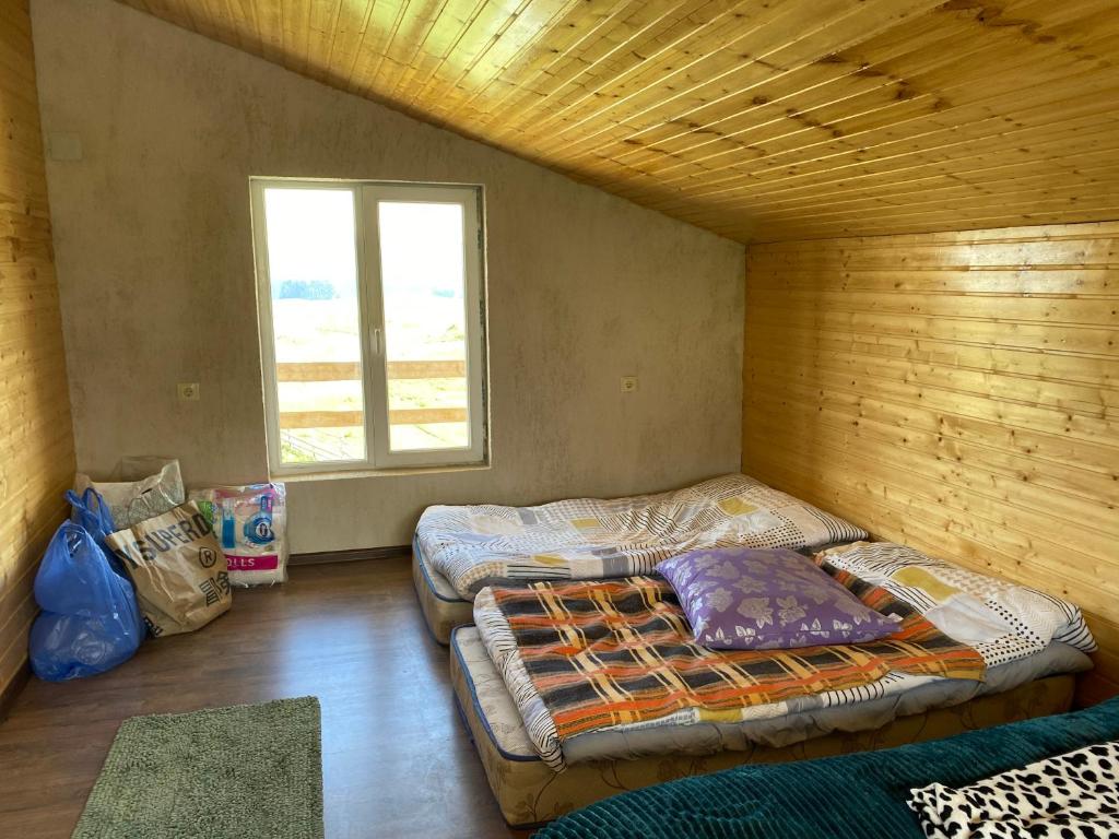 Postel nebo postele na pokoji v ubytování სასტუმრო ქორულდი / Hotel Koruldi