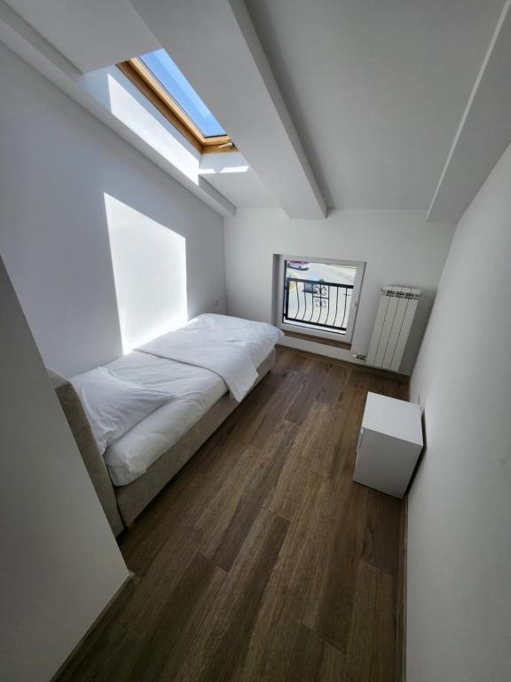 Postel nebo postele na pokoji v ubytování New Lux