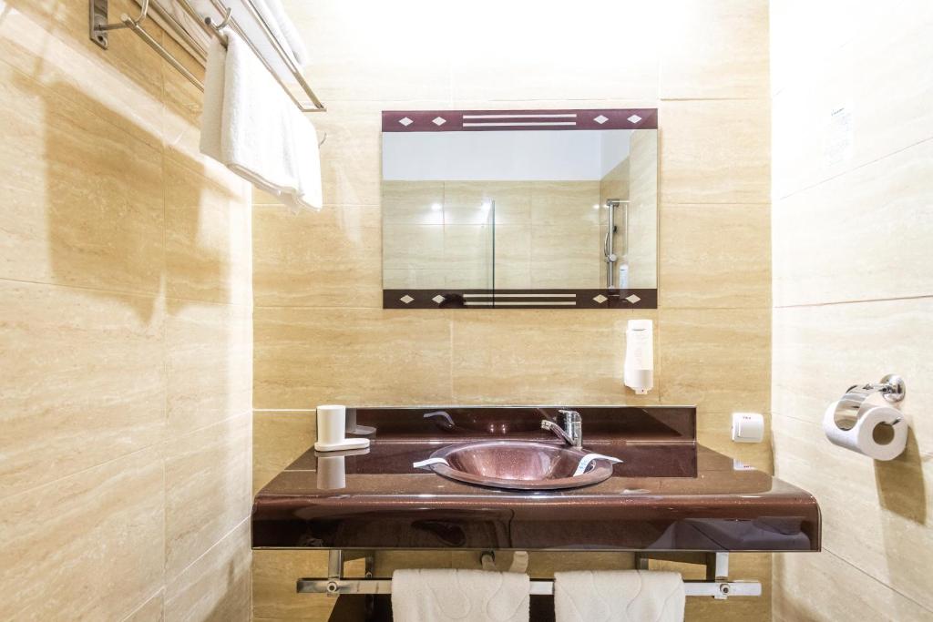 Koupelna v ubytování Hotel Recif