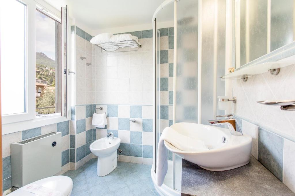 Koupelna v ubytování Hotel Sorriso