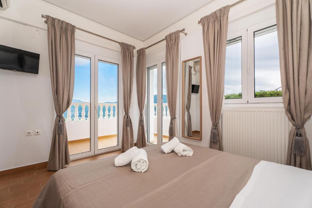 Postel nebo postele na pokoji v ubytování Dream Villa with Seaviews