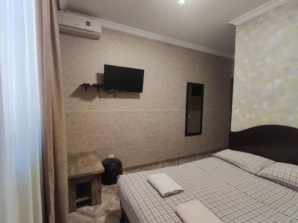 Postel nebo postele na pokoji v ubytování Hotel VENUS