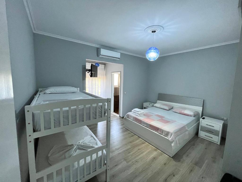 Postel nebo postele na pokoji v ubytování Vila Gregor