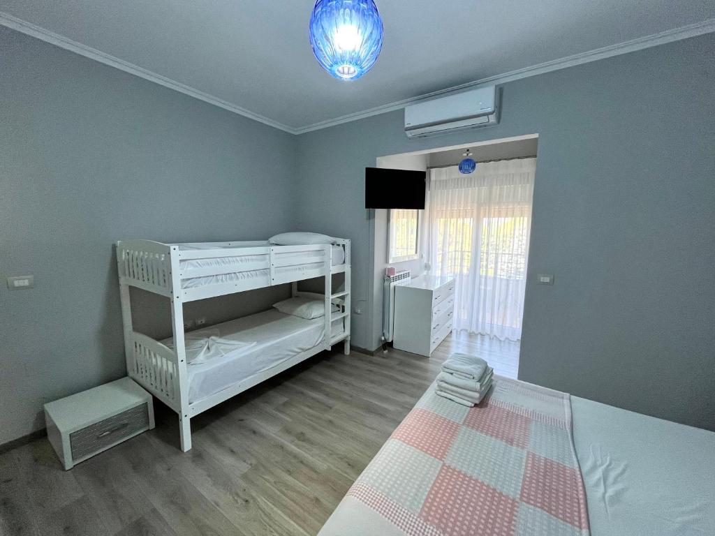 Postel nebo postele na pokoji v ubytování Vila Gregor