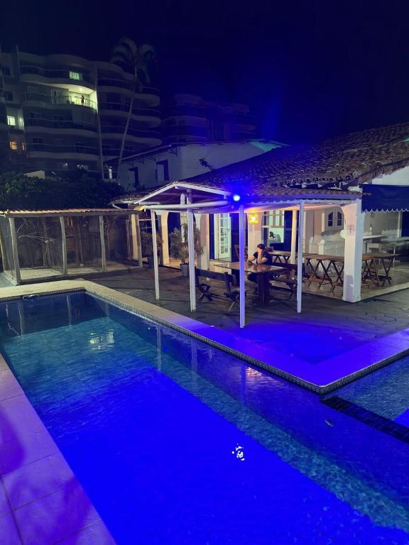A piscina localizada em Pousada e Hostel Arauna ou nos arredores