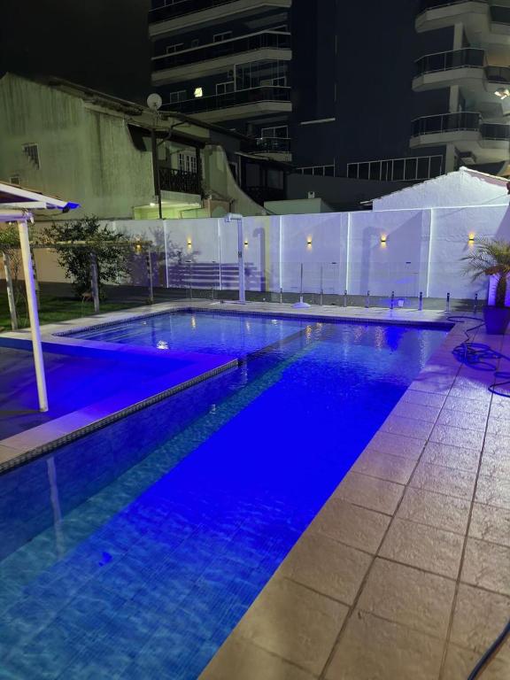 A piscina localizada em Pousada e Hostel Arauna ou nos arredores