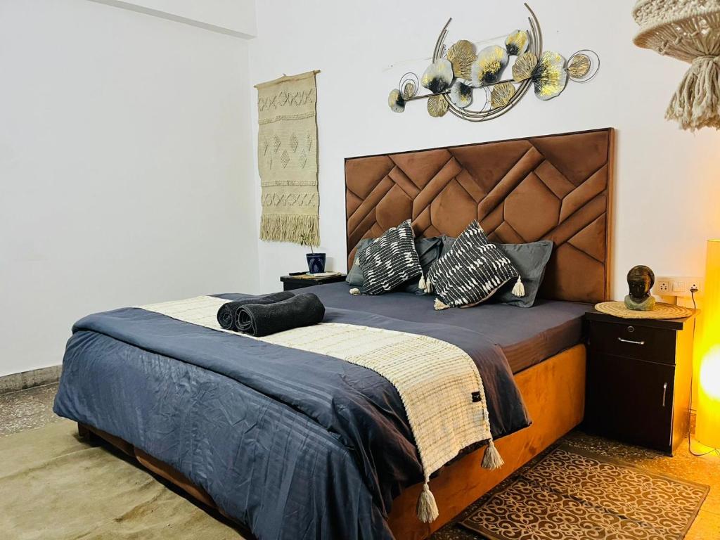 Postel nebo postele na pokoji v ubytování Goaround Homes Kalkaji, South Delhi
