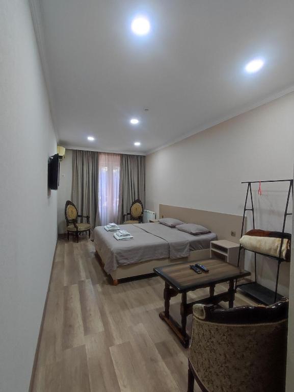 Postel nebo postele na pokoji v ubytování Hotel VENUS