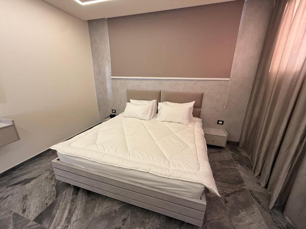 Postel nebo postele na pokoji v ubytování Aquarius Touristic Resort