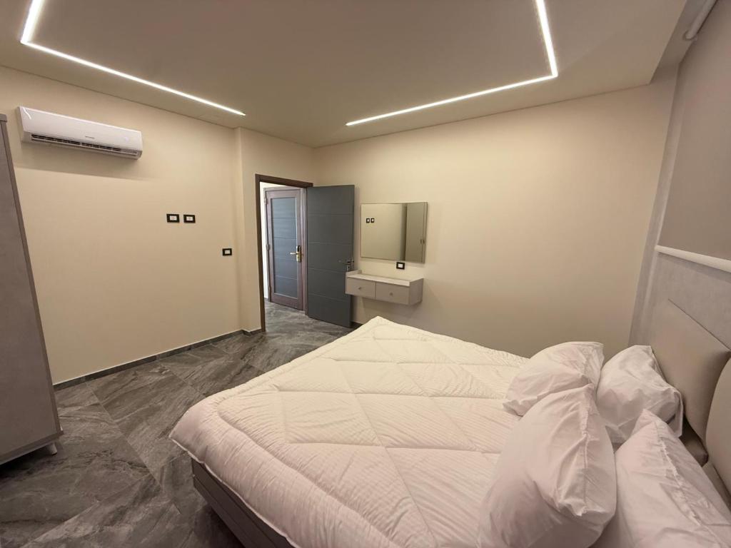 Postel nebo postele na pokoji v ubytování Aquarius Touristic Resort
