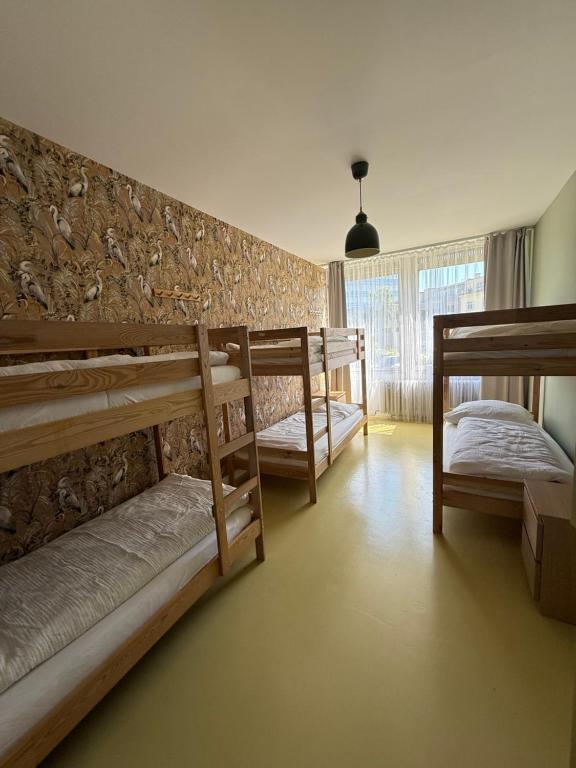 Postel nebo postele na pokoji v ubytování Hostel Prazacka