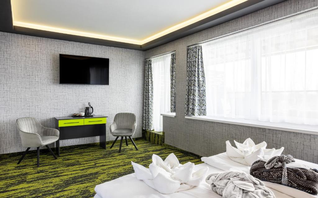 TV a/nebo společenská místnost v ubytování Thermal Hotel Garden