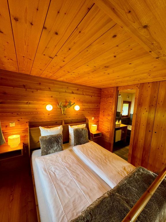Postel nebo postele na pokoji v ubytování Le Hameau des Biquettes