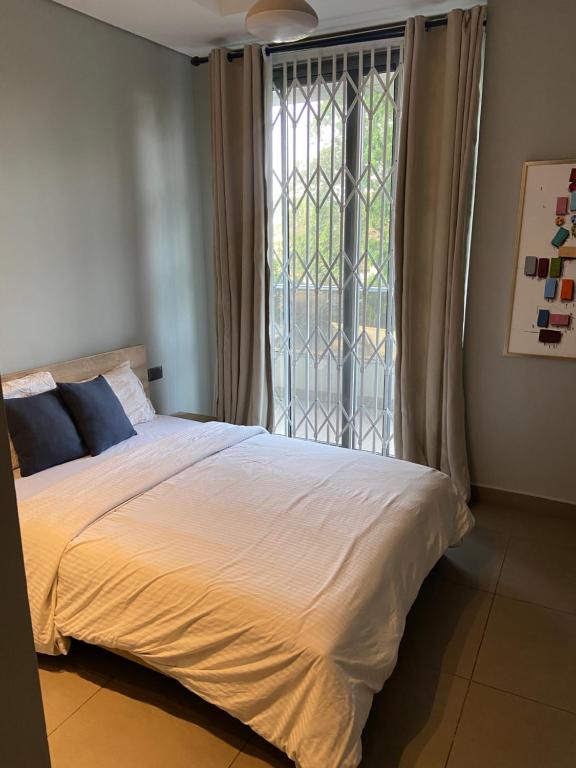 Tempat tidur dalam kamar di Iris loft