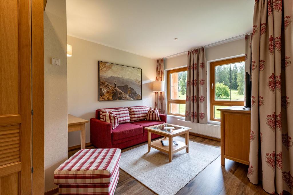 A bed or beds in a room at Alpenvital Tirol Appartements