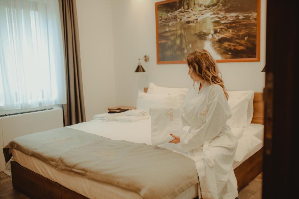 Postel nebo postele na pokoji v ubytování Soko IN Spa