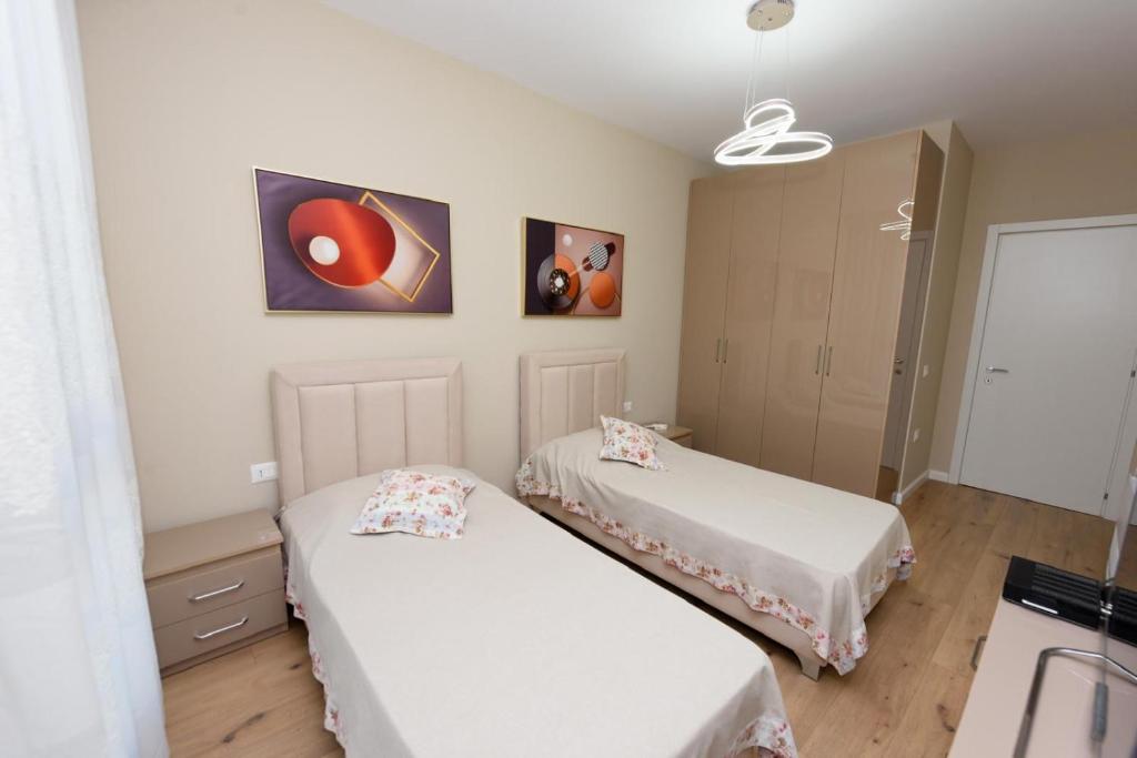 Postel nebo postele na pokoji v ubytování Eda apartment