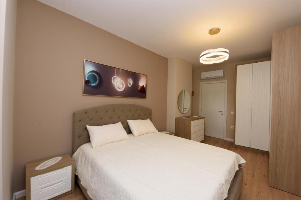 Postel nebo postele na pokoji v ubytování Eda apartment
