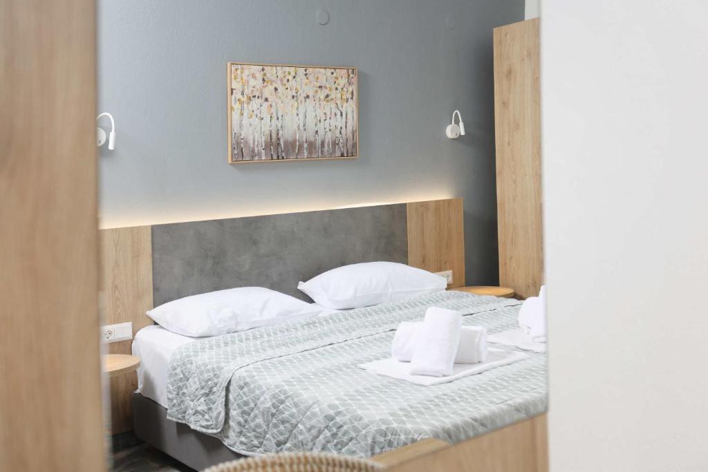 Voodi või voodid majutusasutuse Hotel Adonis toas
