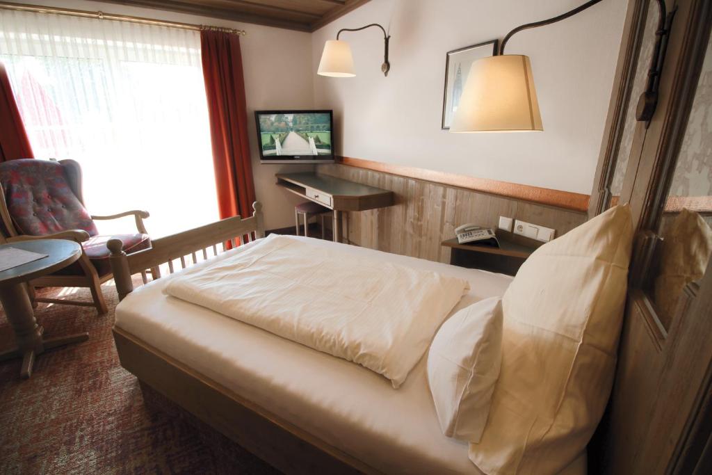 TV a/nebo společenská místnost v ubytování Hotel Promenade