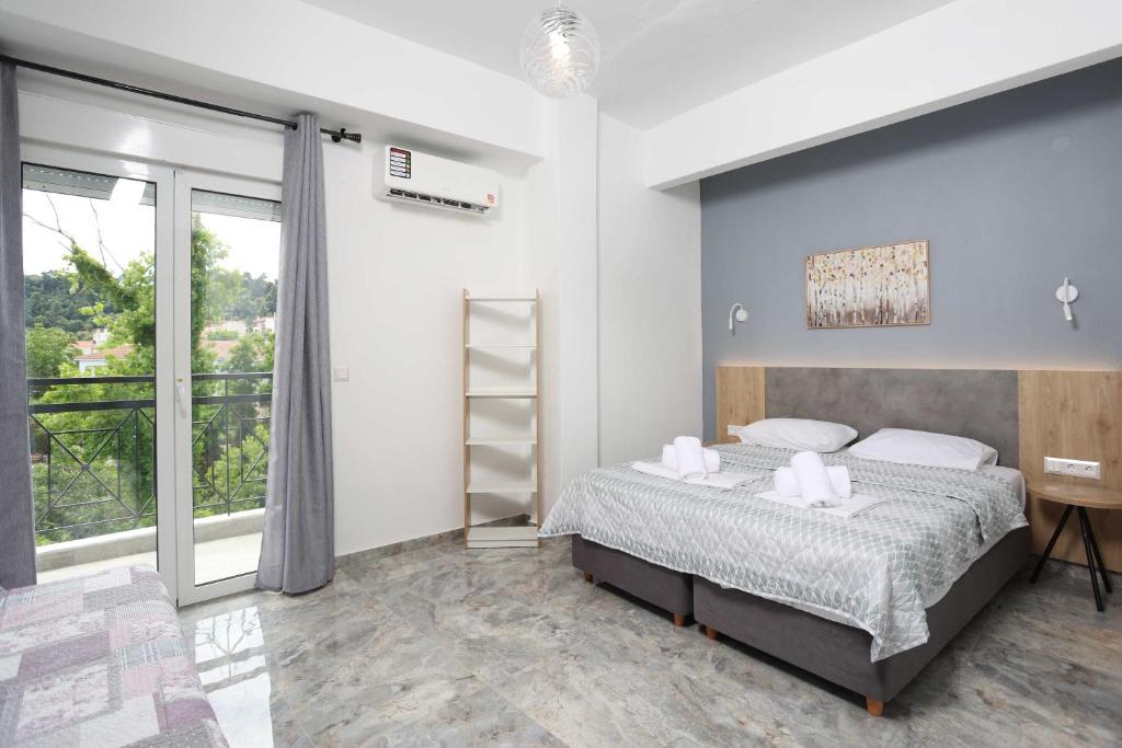 Voodi või voodid majutusasutuse Hotel Adonis toas