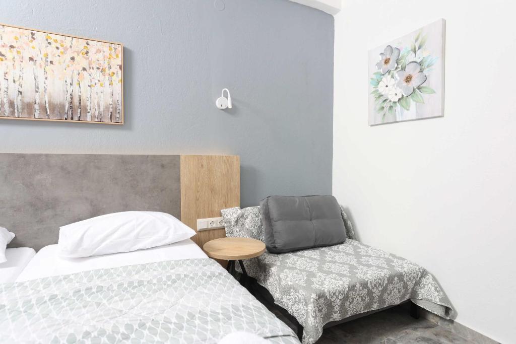 Voodi või voodid majutusasutuse Hotel Adonis toas