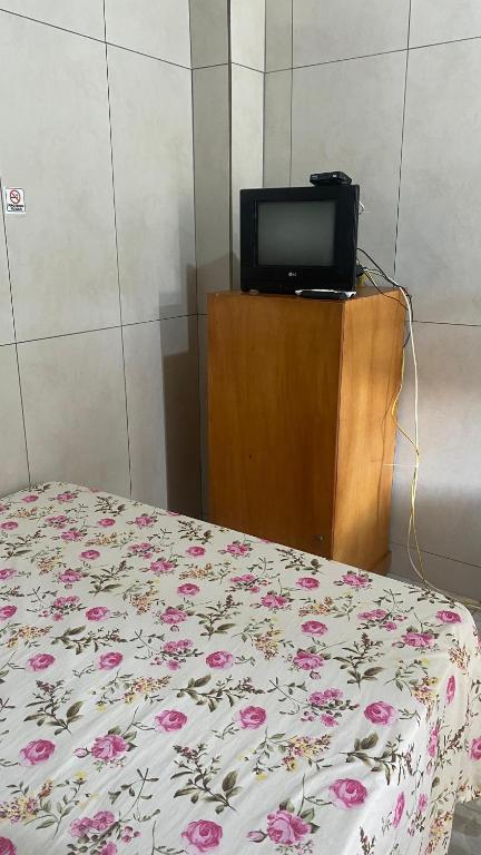 TV a/nebo společenská místnost v ubytování Pousada e Alojamento Engenho de Itaguaí