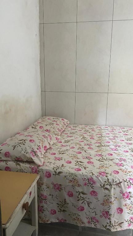 Postel nebo postele na pokoji v ubytování Pousada e Alojamento Engenho de Itaguaí