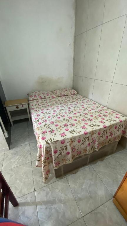 Postel nebo postele na pokoji v ubytování Pousada e Alojamento Engenho de Itaguaí