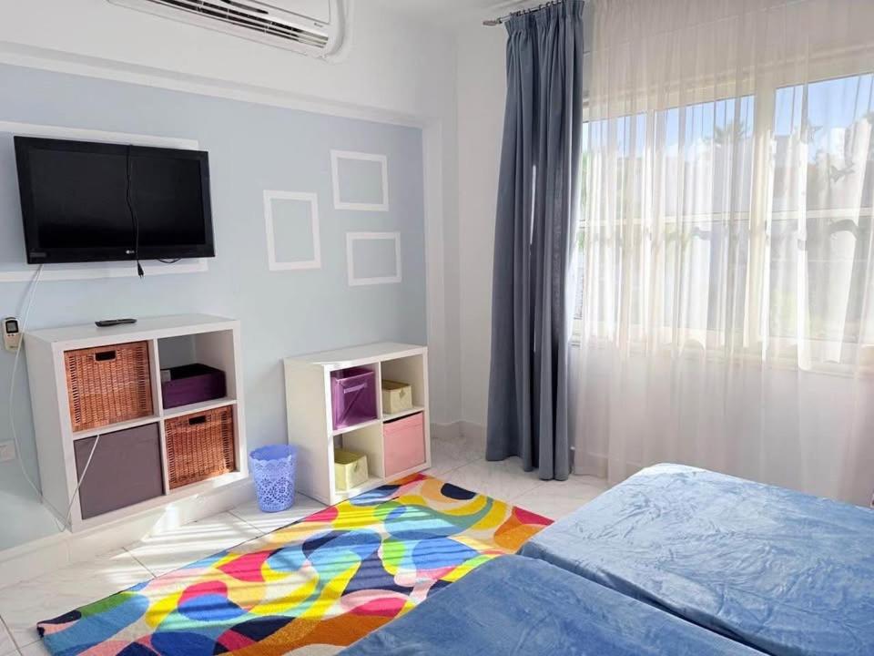 Ένα ή περισσότερα κρεβάτια σε δωμάτιο στο Spacious Villa Sharm El Sheikh Delta Sharm