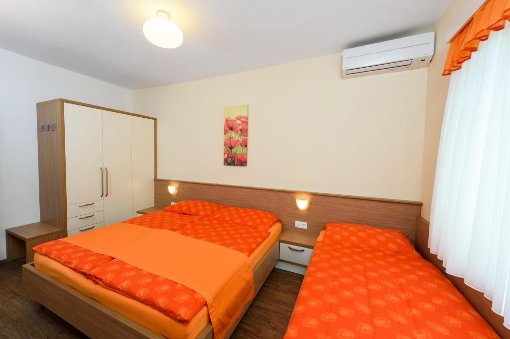 Postel nebo postele na pokoji v ubytování Sea View Guesthouse Opara