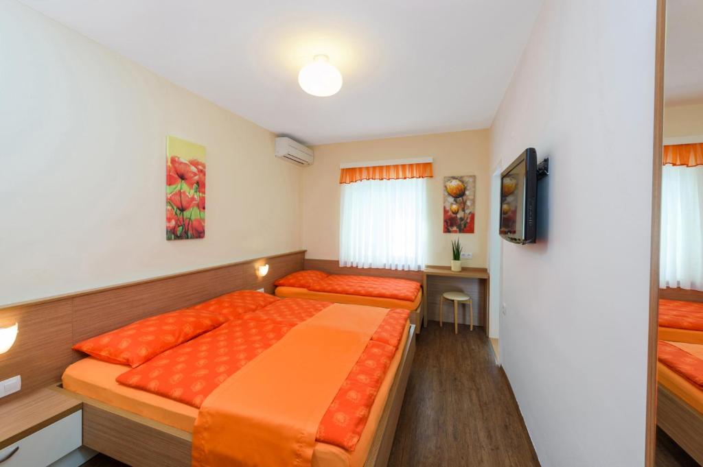 Postel nebo postele na pokoji v ubytování Sea View Guesthouse Opara