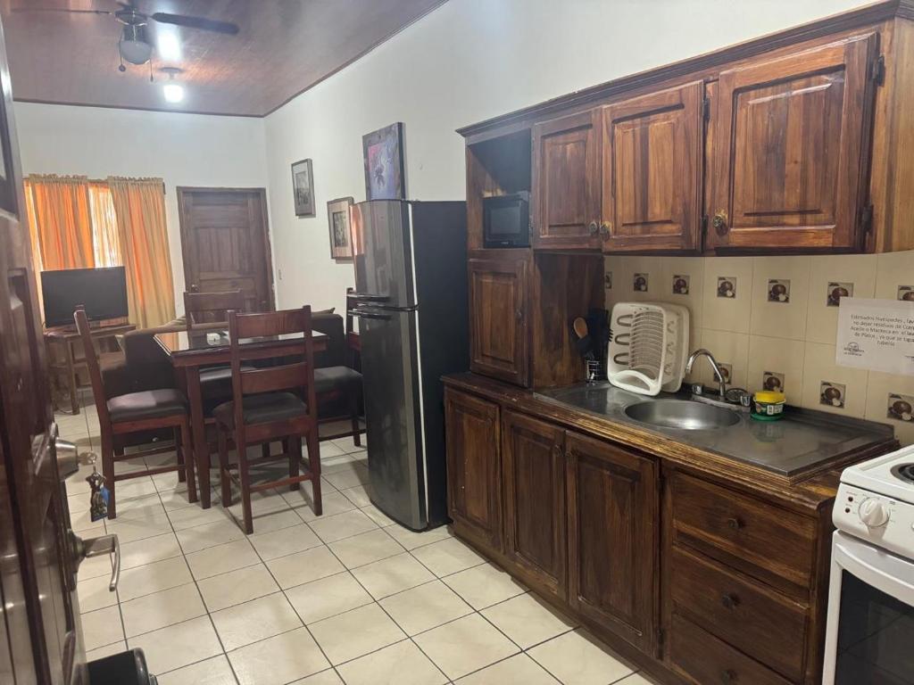 Kuchyň nebo kuchyňský kout v ubytování Apartamentos del Puerto