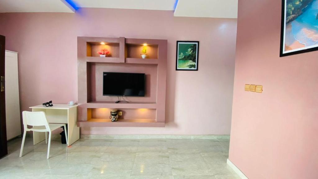 TV a/nebo společenská místnost v ubytování Petalz Home
