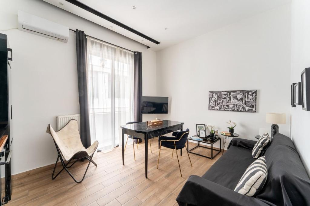 Televízia a/alebo spoločenská miestnosť v ubytovaní Neo Luxury Suite