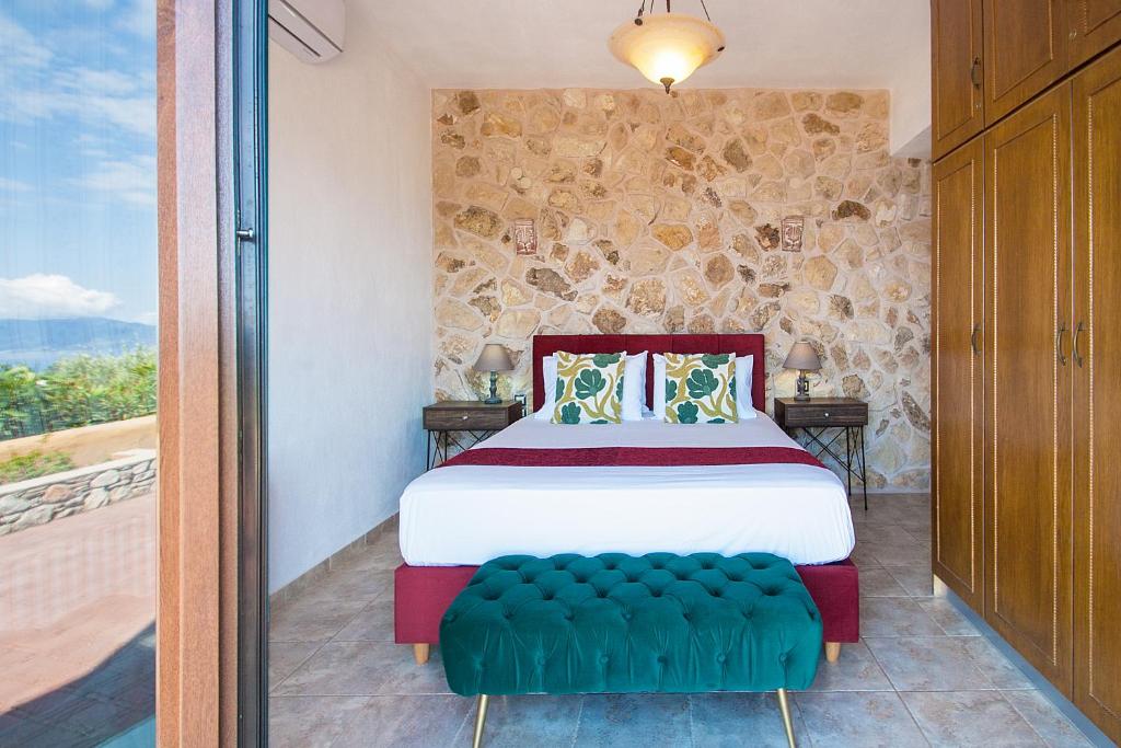 Postel nebo postele na pokoji v ubytování Villa Fotini