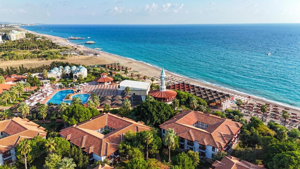 an aerial view of a resort and the ocean at Ali Bey Club & Park in Kizilagac
