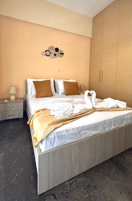 Postel nebo postele na pokoji v ubytování Seaside Nest Corinth