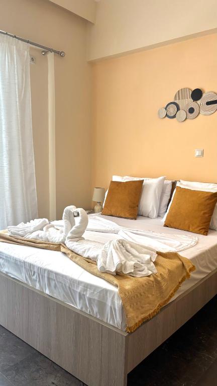 Postel nebo postele na pokoji v ubytování Seaside Nest Corinth