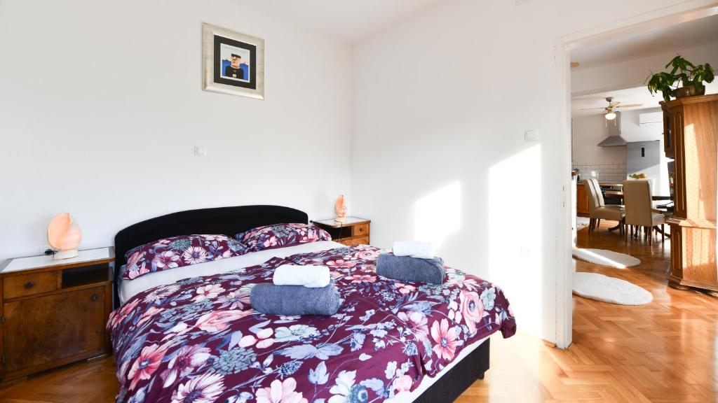 Postel nebo postele na pokoji v ubytování Apartman PIK