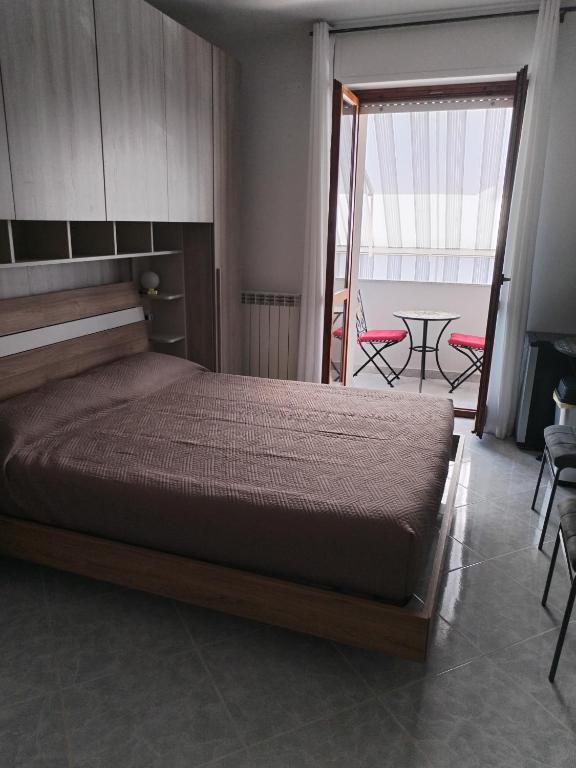 Postel nebo postele na pokoji v ubytování RIU b&b ALGHERO